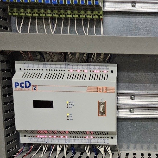 Old Saia-Burgess PCD2 controller installed in an electrical cabinet